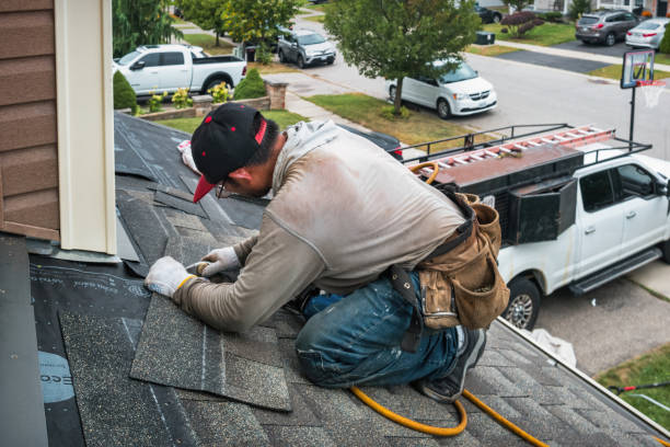 Professional Roofing technician working in Caledonia, ND
